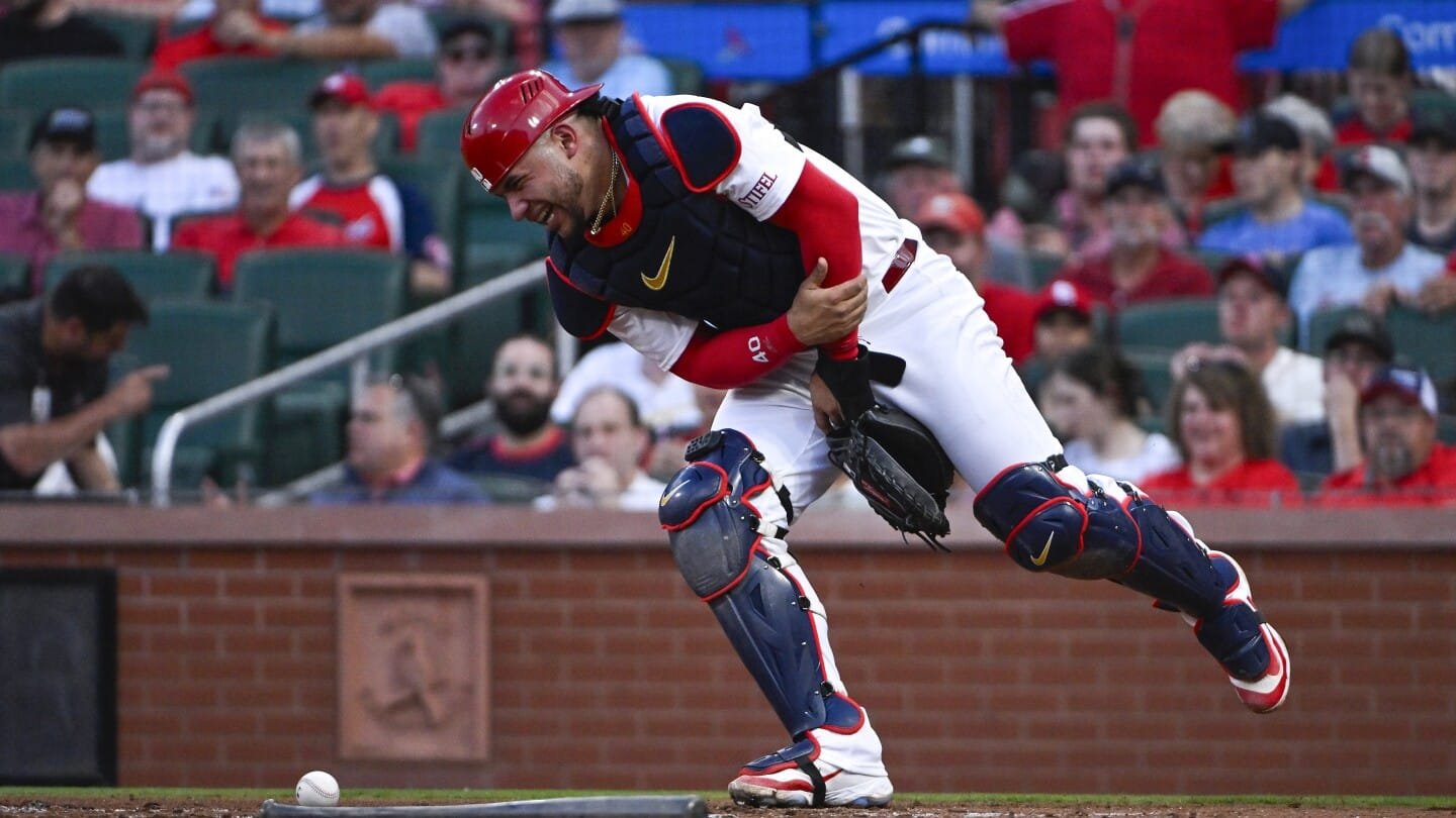 Baseball Player Hits Catcher With Bat